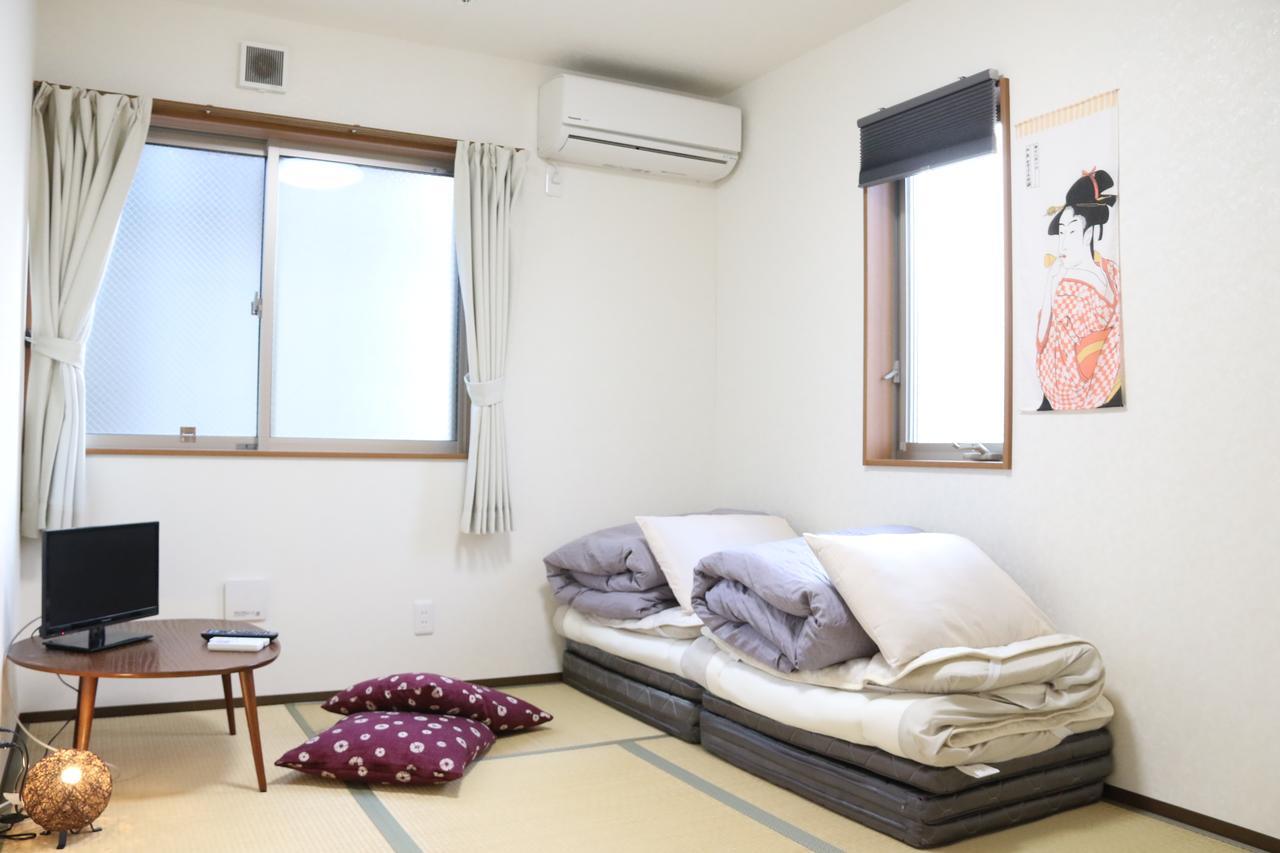 Tokiyo Hostel Toyonaka Buitenkant foto